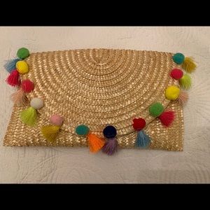 EUC Tiff and Jen Pom Pom rattan clutch
